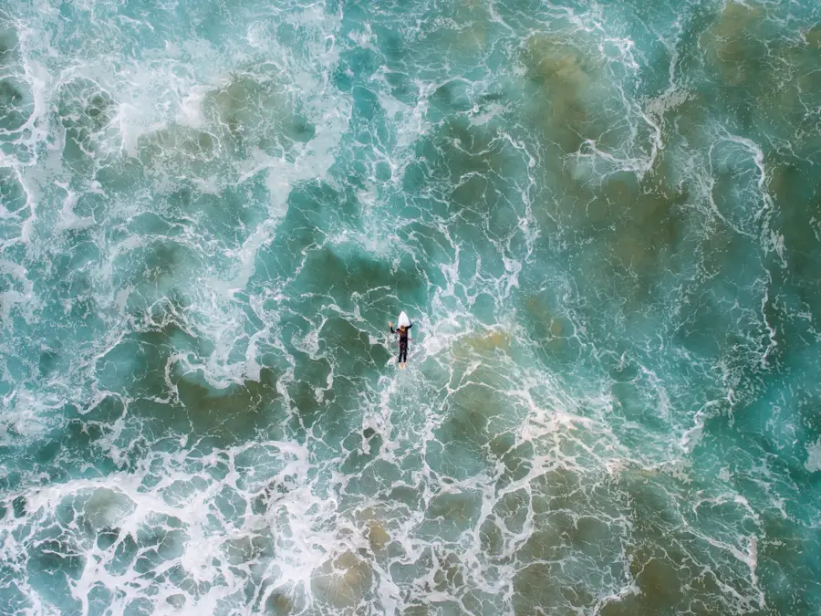Top down view of surfer at Narrabeen, NSW
