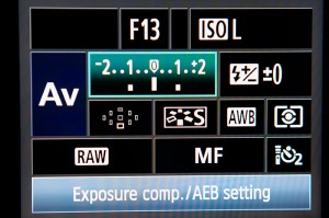 Using the dial on your camera, dial to this to the right and lines like above will appear. This indicates that an under exposed, normal exposed and over exposed image will be captured