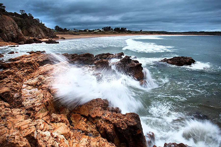 An overcast sunrise at Clifton Beach